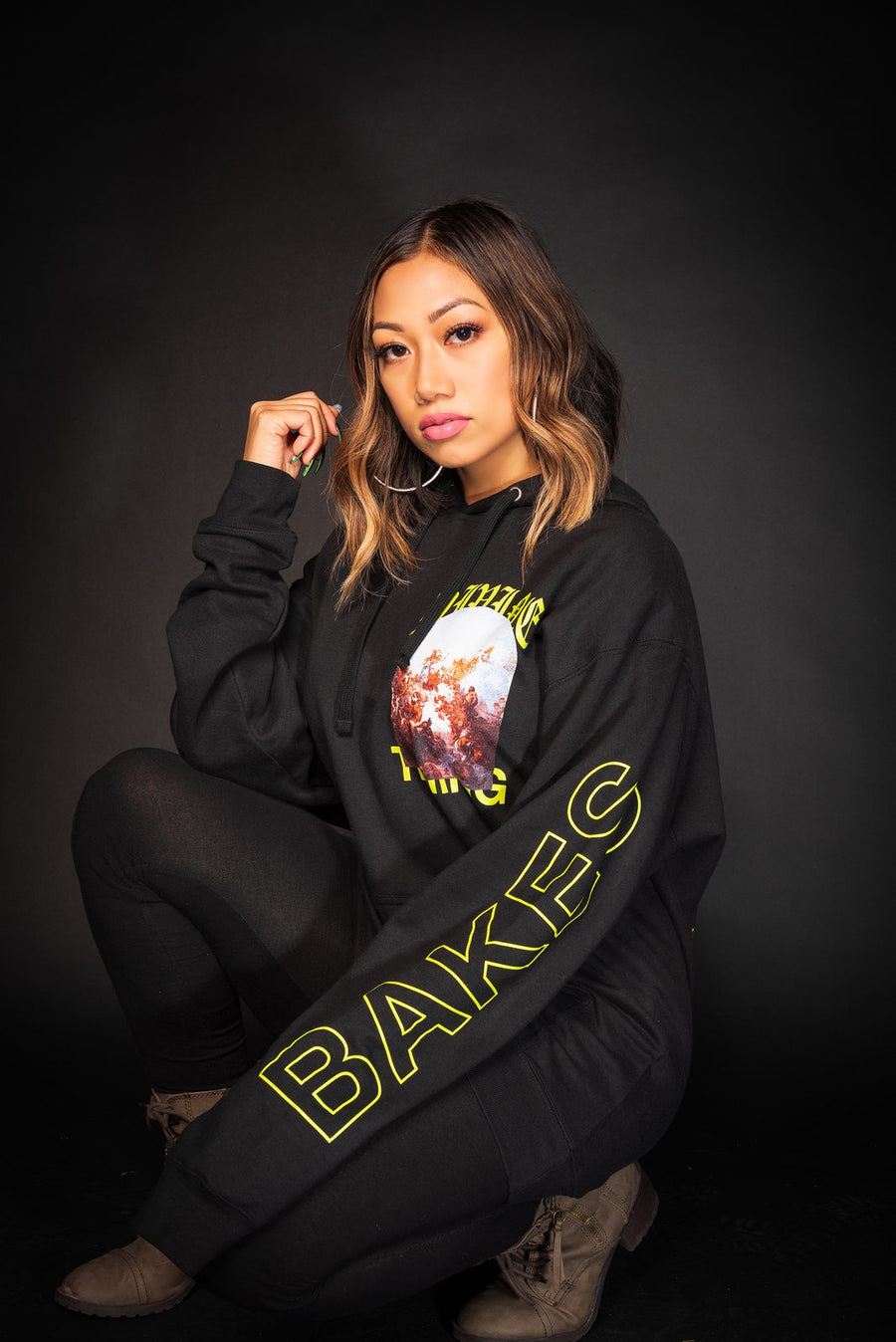 Divine Timing Black Hoodie, front, on a model