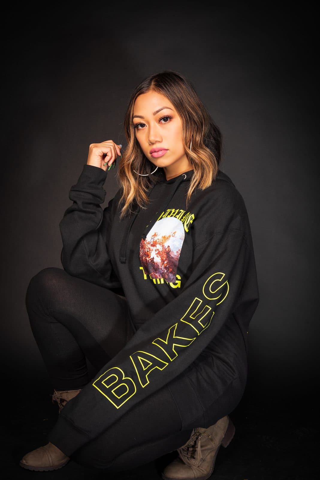 Divine Timing Black Hoodie, front, on a model