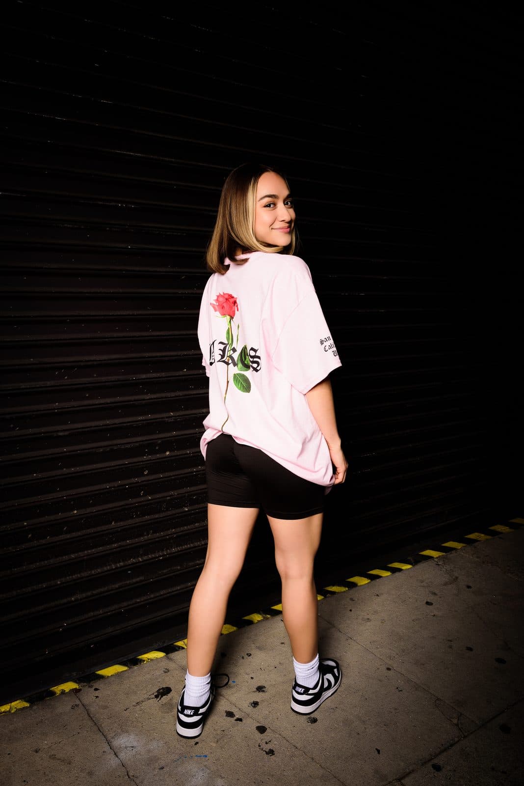 Divine Timing Pink Tee, on a second model
